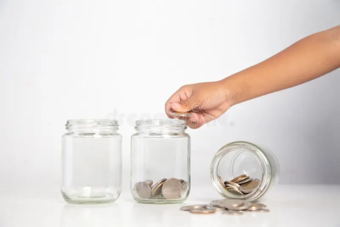 A child has a bottle full of pennies